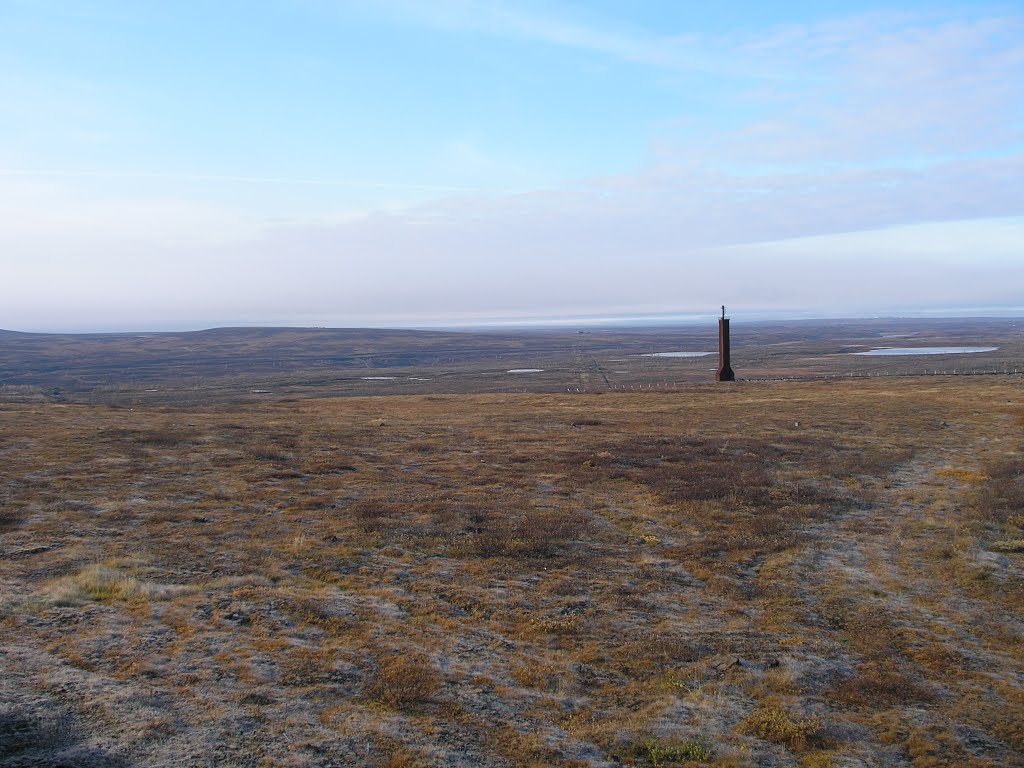 Polar sun over tundra and calibration masts, Norilsk Vega MS